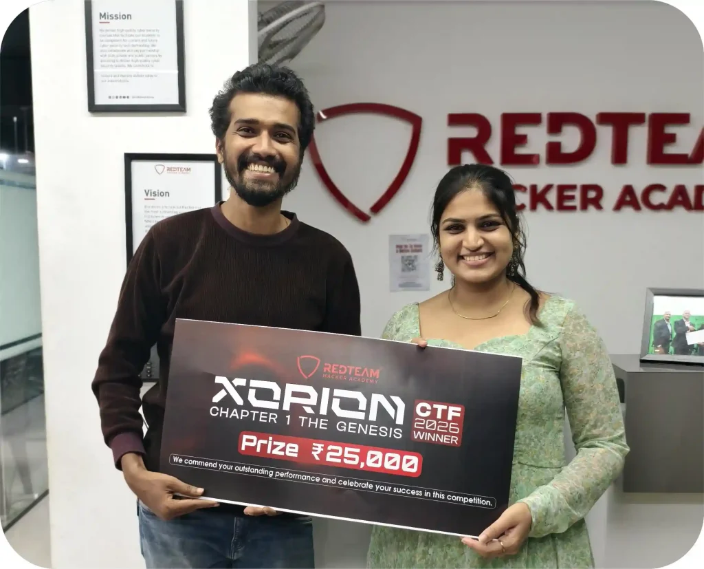 Winners holding prize cheque at RedTeam Hacker Academy during Cyber Security CTF Competition India event XORION 2026.