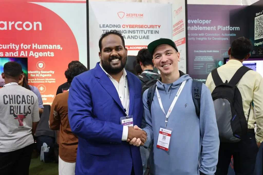Attendees networking at the RedTeam Hacker Academy booth during the IdentityShield Summit 2026 cybersecurity event in Pune.RedTeam Academy Events